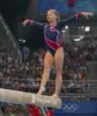 Shawn Johnson dismounts the balance beam
